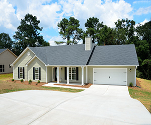 white garage door side of the house